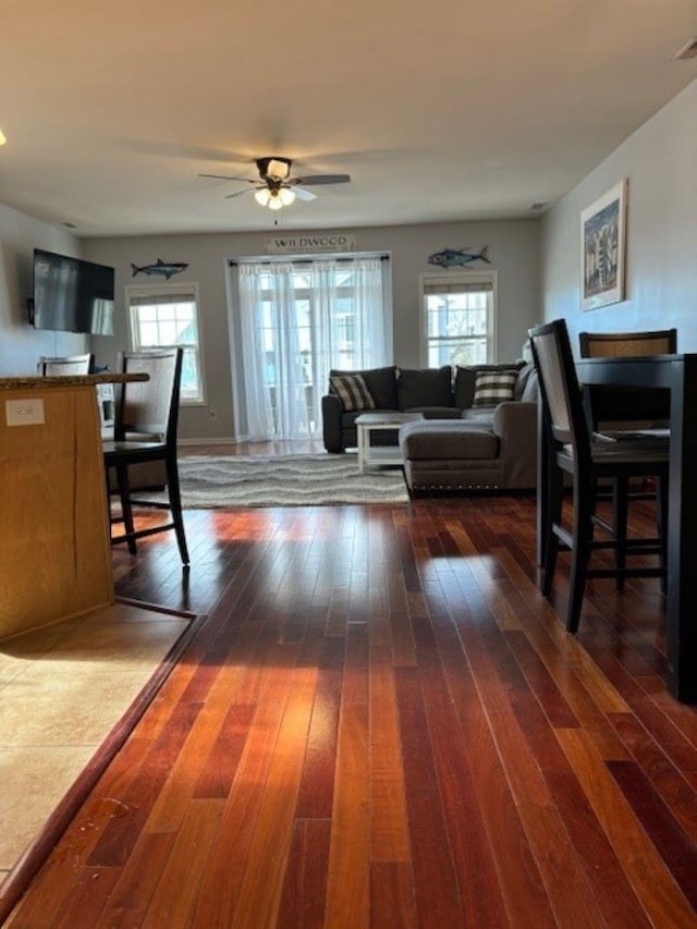 145 W Andrews Ave Unit 100, Wildwood, NJ 08260 - living room with plenty of natural light, dark wood-style floors, and ceiling fan