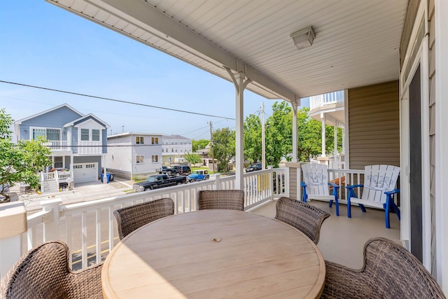 145 W Andrews Ave Unit 100, Wildwood, NJ 08260 - view of patio featuring outdoor dining space and a residential view