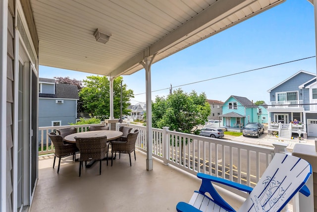 145 W Andrews Ave Unit 100, Wildwood, NJ 08260 - porch with a residential view and outdoor dining space