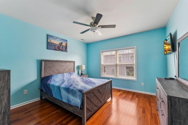 145 W Andrews Ave Unit 100, Wildwood, NJ 08260 - bedroom with wood finished floors and a ceiling fan