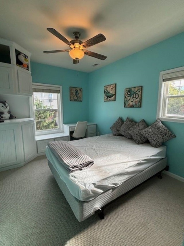 145 W Andrews Ave Unit 100, Wildwood, NJ 08260 - bedroom with light colored carpet and a ceiling fan
