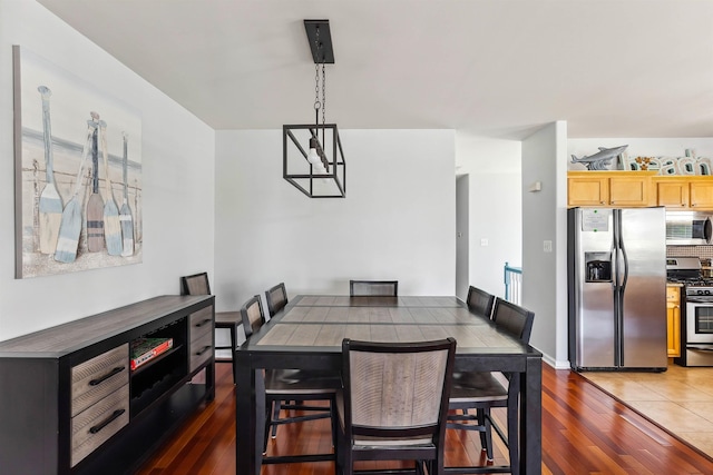 145 W Andrews Ave Unit 100, Wildwood, NJ 08260 - dining area with wood finished floors