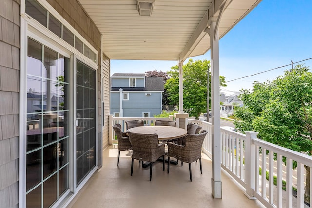 145 W Andrews Ave Unit 100, Wildwood, NJ 08260 - balcony featuring outdoor dining area