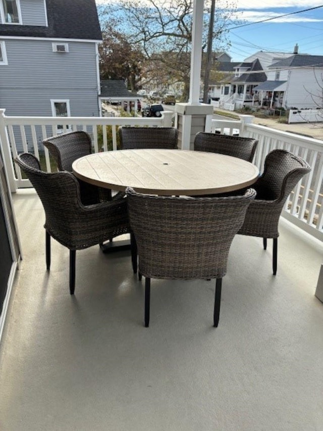 145 W Andrews Ave Unit 100, Wildwood, NJ 08260 - view of patio featuring outdoor dining space and a residential view