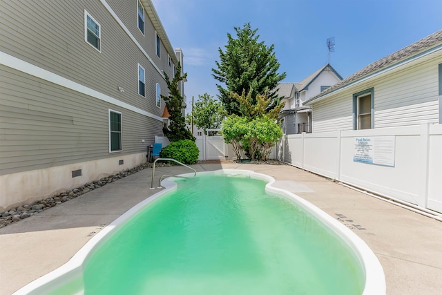 145 W Andrews Ave Unit 100, Wildwood, NJ 08260 - view of swimming pool featuring a gate and a patio