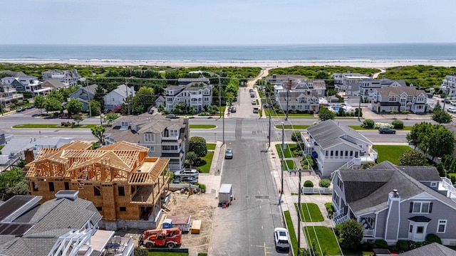 215 60th St, Avalon, NJ 08202 - aerial perspective of suburban area featuring a nearby body of water