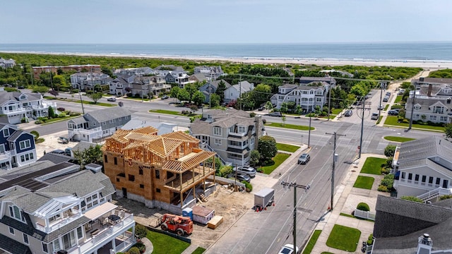 215 60th St, Avalon, NJ 08202 - aerial perspective of suburban area featuring a nearby body of water
