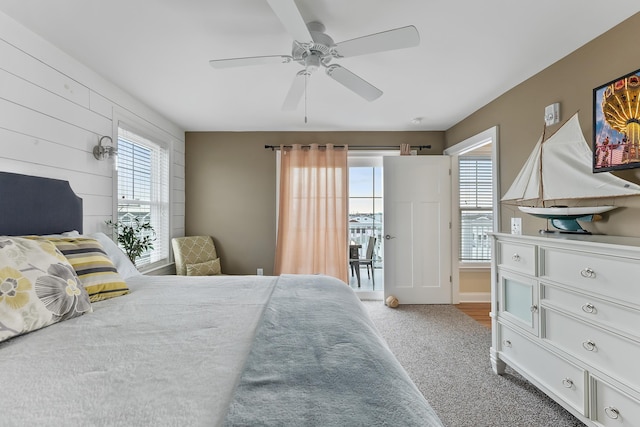 bedroom with ceiling fan and carpet flooring