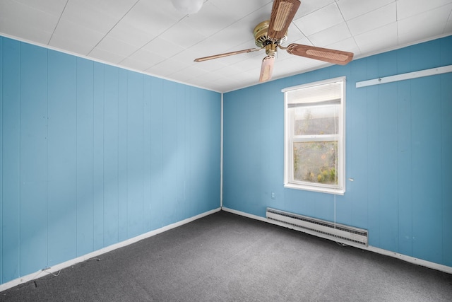 unfurnished room featuring carpet floors, a baseboard radiator, and ceiling fan