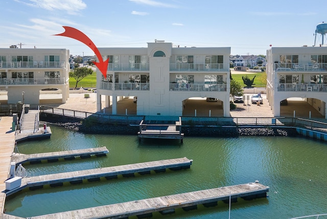 view of dock with a water view