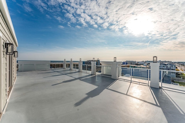 view of patio terrace at dusk