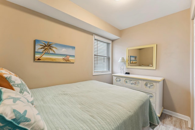 bedroom featuring light wood-type flooring