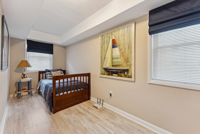 bedroom with hardwood / wood-style flooring