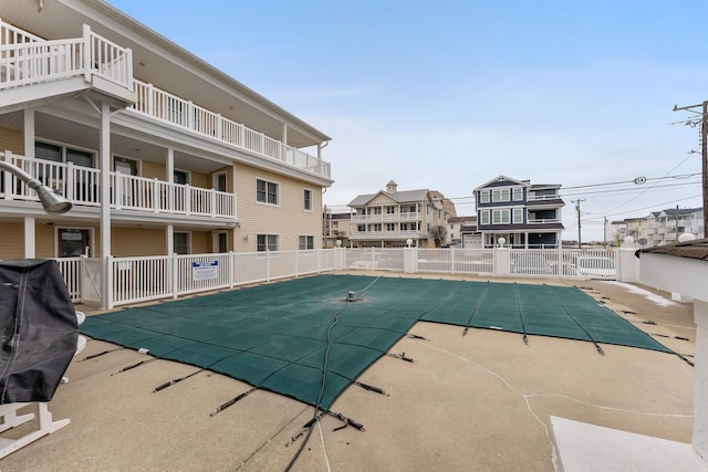 view of swimming pool with a patio area