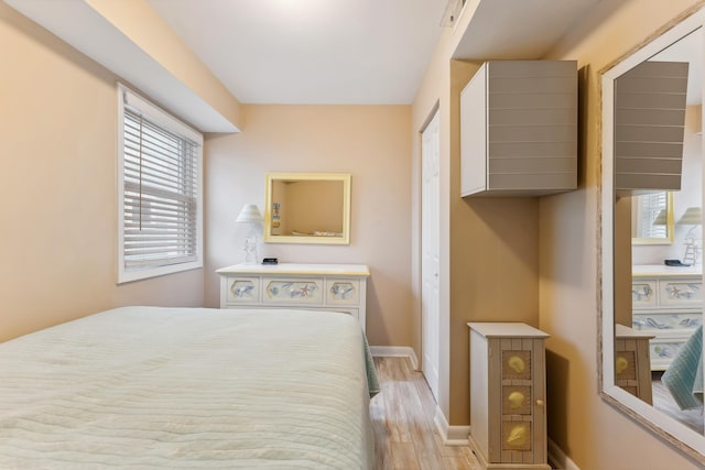 bedroom featuring light hardwood / wood-style flooring