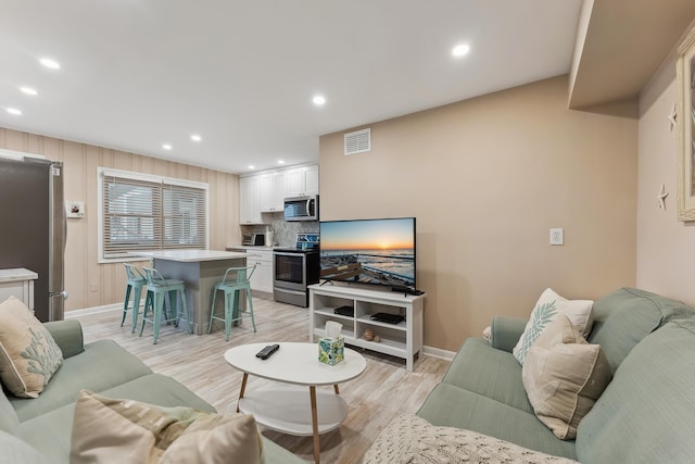 living room with light wood-type flooring