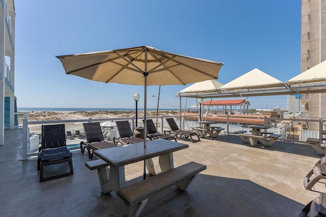 view of patio / terrace featuring a water view