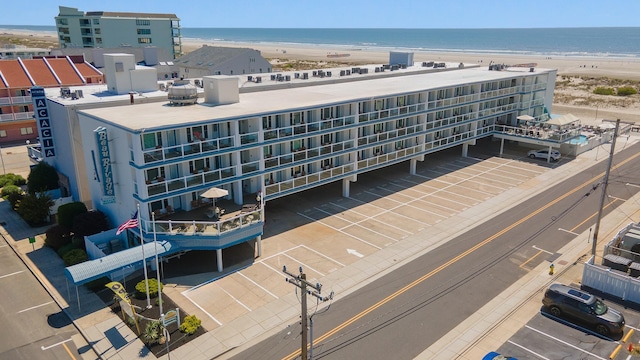 aerial view with a view of the beach and a water view