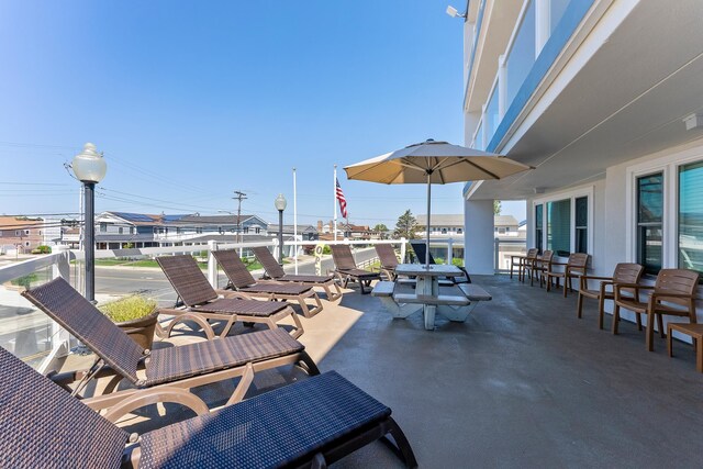 view of patio with a balcony