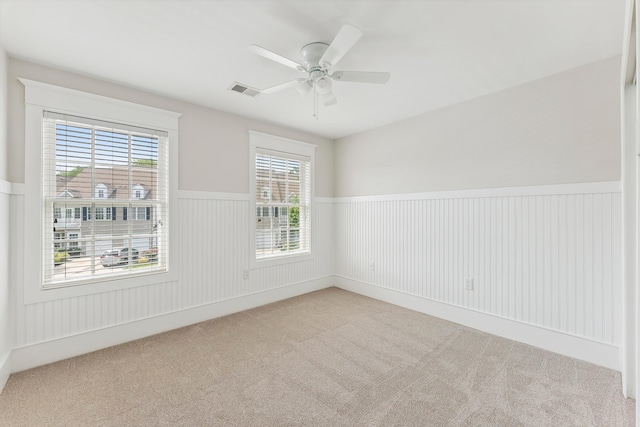 201 Saint Andrews Dr Unit 201, Swainton, NJ 08210 - spare room with carpet floors, wainscoting, and ceiling fan