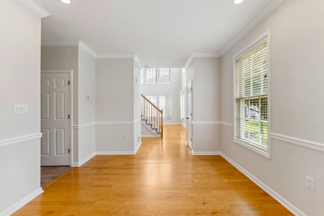 201 Saint Andrews Dr Unit 201, Swainton, NJ 08210 - unfurnished room featuring light wood-style flooring, stairway, recessed lighting, crown molding, and baseboards