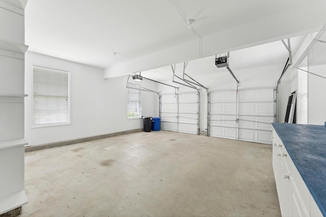 201 Saint Andrews Dr Unit 201, Swainton, NJ 08210 - garage with a garage door opener and baseboards