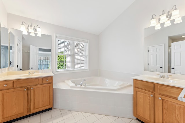 201 Saint Andrews Dr Unit 201, Swainton, NJ 08210 - full bath featuring two vanities, lofted ceiling, tile patterned flooring, and a garden tub