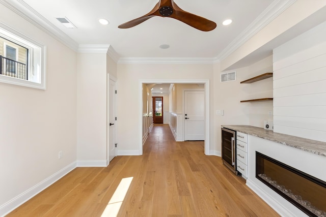 427 E 5th Ave, North Wildwood, NJ 08260 - kitchen with beverage cooler, open shelves, light wood-type flooring, ornamental molding, and ceiling fan