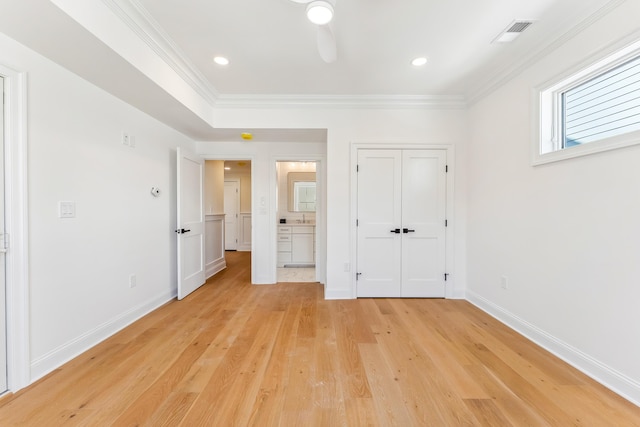 427 E 5th Ave, North Wildwood, NJ 08260 - unfurnished bedroom with light wood-type flooring, ornamental molding, a closet, ensuite bathroom, and recessed lighting