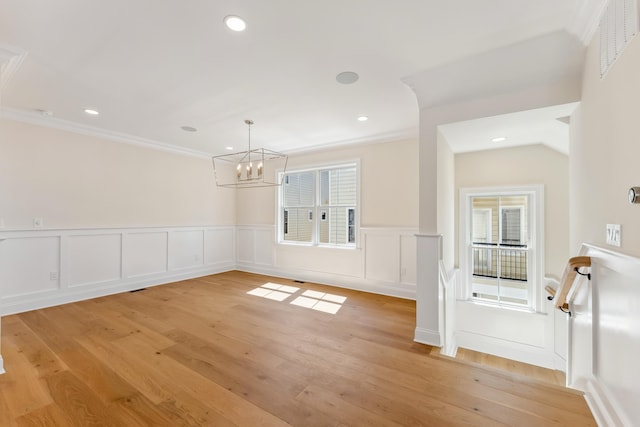 427 E 5th Ave, North Wildwood, NJ 08260 - unfurnished dining area featuring a chandelier, crown molding, light wood finished floors, healthy amount of natural light, and recessed lighting