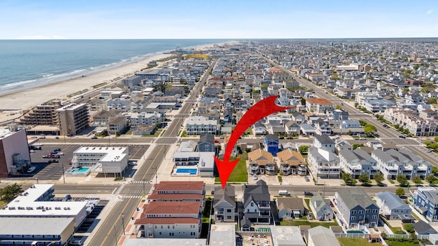 427 E 5th Ave, North Wildwood, NJ 08260 - drone / aerial view of waterfront with a beach