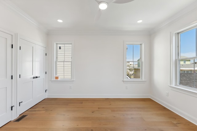 427 E 5th Ave, North Wildwood, NJ 08260 - unfurnished bedroom featuring multiple windows, light wood-style flooring, ornamental molding, recessed lighting, and a ceiling fan