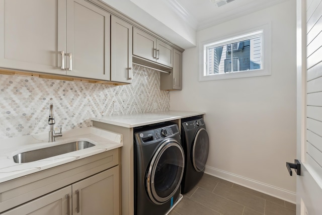 427 E 5th Ave, North Wildwood, NJ 08260 - laundry area featuring washing machine and dryer, cabinet space, crown molding, and tile patterned floors