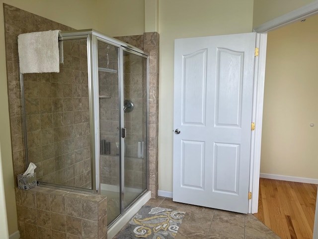 bathroom featuring tile patterned floors and walk in shower