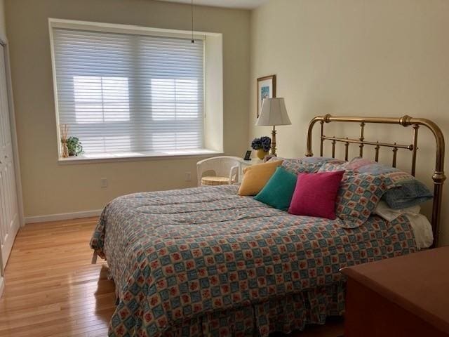 bedroom featuring light wood-type flooring