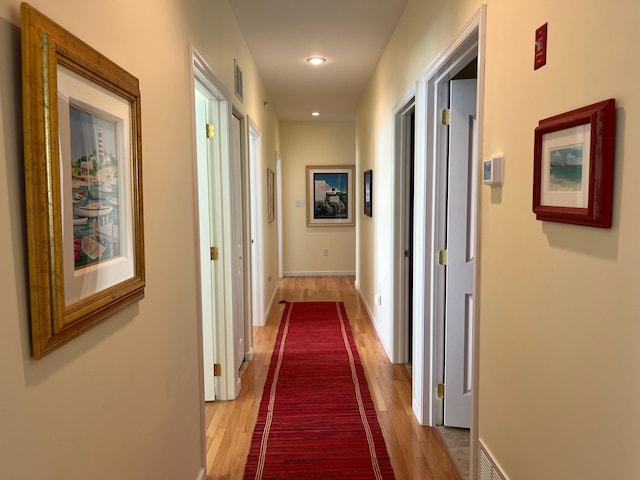 hall featuring hardwood / wood-style floors