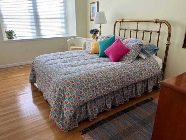 bedroom with light wood-type flooring