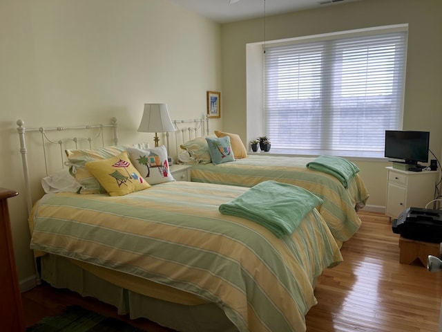 bedroom featuring light hardwood / wood-style floors