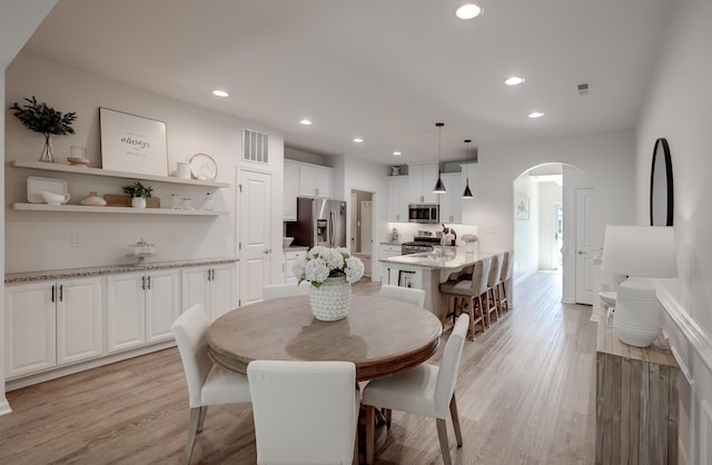 106 Bay Breeze Blvd Unit 106, Cape May Court House, NJ 08210 - dining space with arched walkways, light wood-type flooring, and recessed lighting