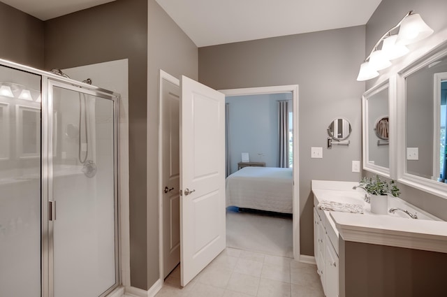 106 Bay Breeze Blvd Unit 106, Cape May Court House, NJ 08210 - ensuite bathroom with a shower stall, tile patterned flooring, double vanity, and baseboards