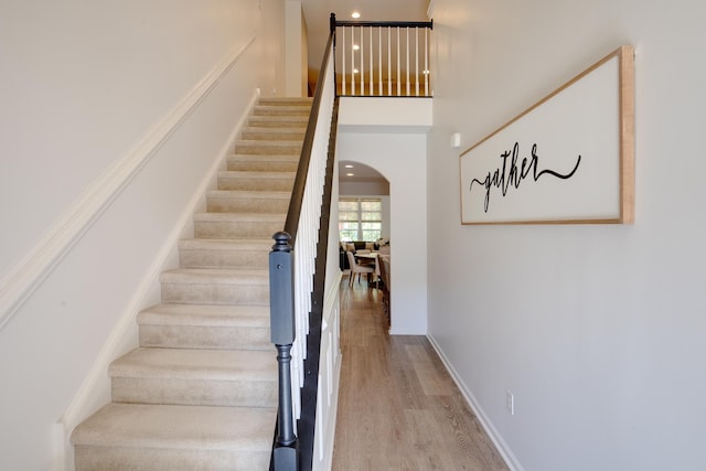 106 Bay Breeze Blvd Unit 106, Cape May Court House, NJ 08210 - stairs featuring arched walkways, wood finished floors, and baseboards