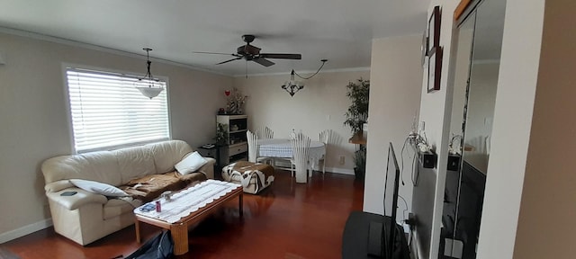 living room featuring ceiling fan, wood finished floors, crown molding, and baseboards