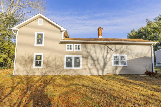 view of home's exterior featuring a lawn