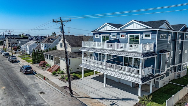 116 W Columbine Rd W, Unit West, Wildwood Crest, NJ 08260 - view of front facade with a balcony and board and batten siding