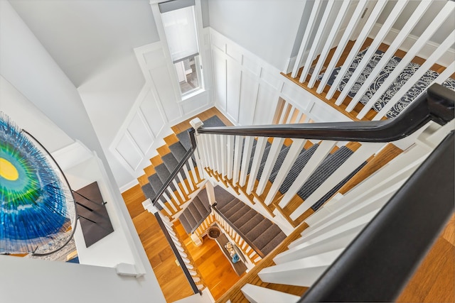 stairs with wood finished floors