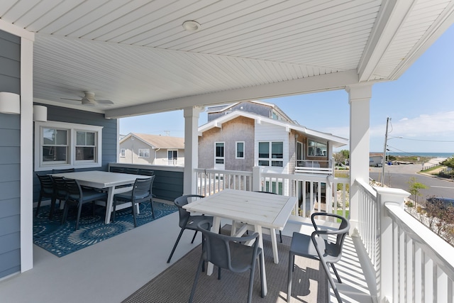 view of patio / terrace featuring outdoor dining area and ceiling fan