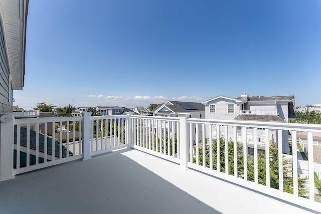 balcony featuring a residential view