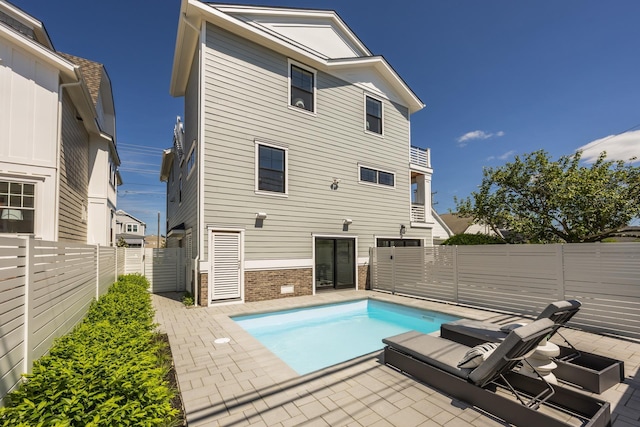 2045 W Ave, Ocean City, NJ 08226 - back of property featuring a patio area, a fenced backyard, and brick siding