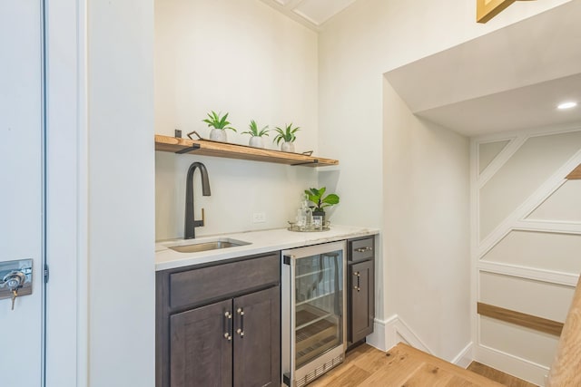 2045 W Ave, Ocean City, NJ 08226 - indoor wet bar with beverage cooler, light wood-style floors, and baseboards