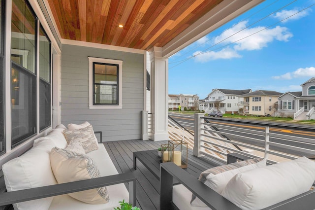 2045 W Ave, Ocean City, NJ 08226 - wooden porch with a residential view and an outdoor hangout area
